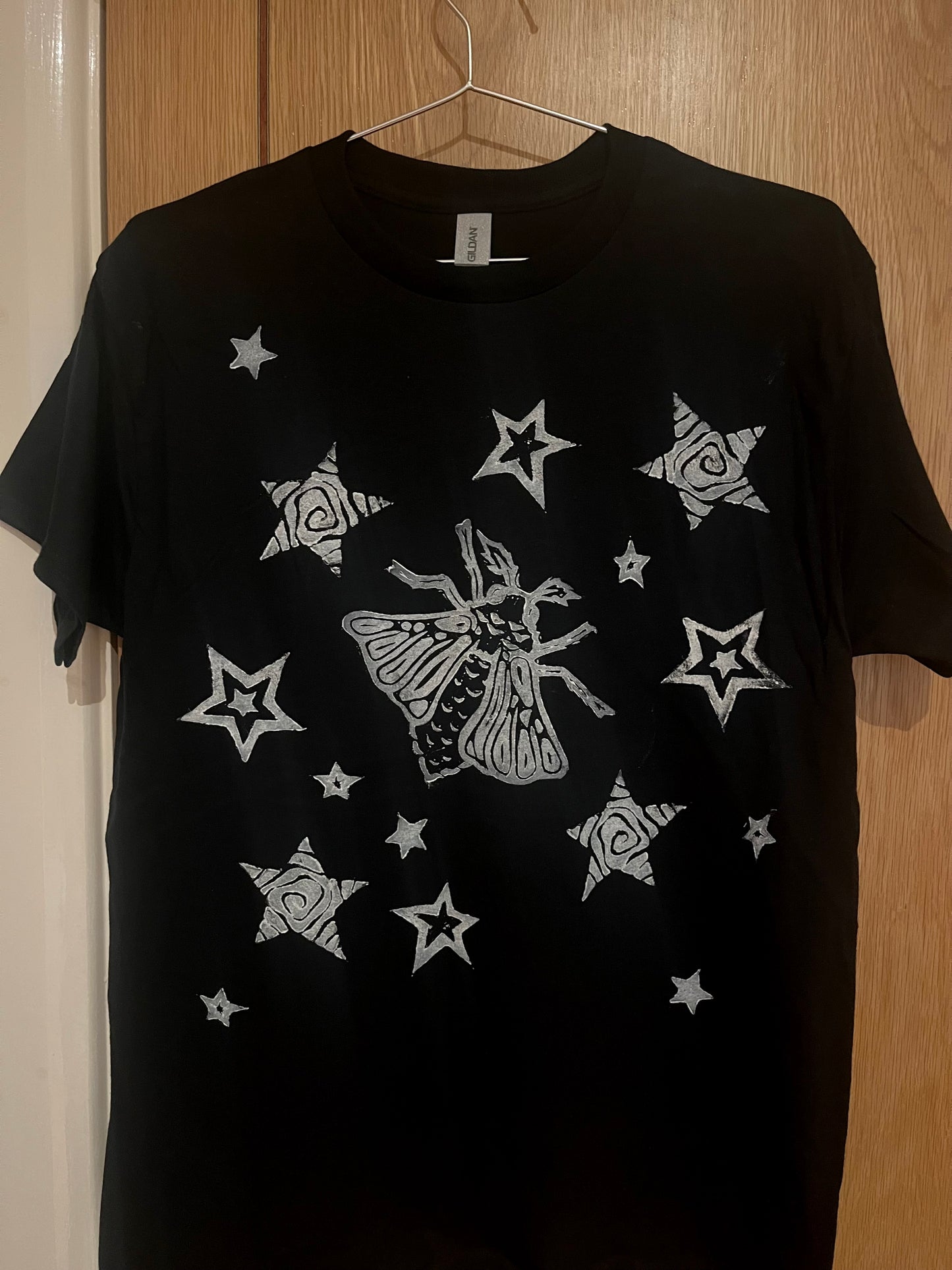 Moth Black Unisex T-Shirt